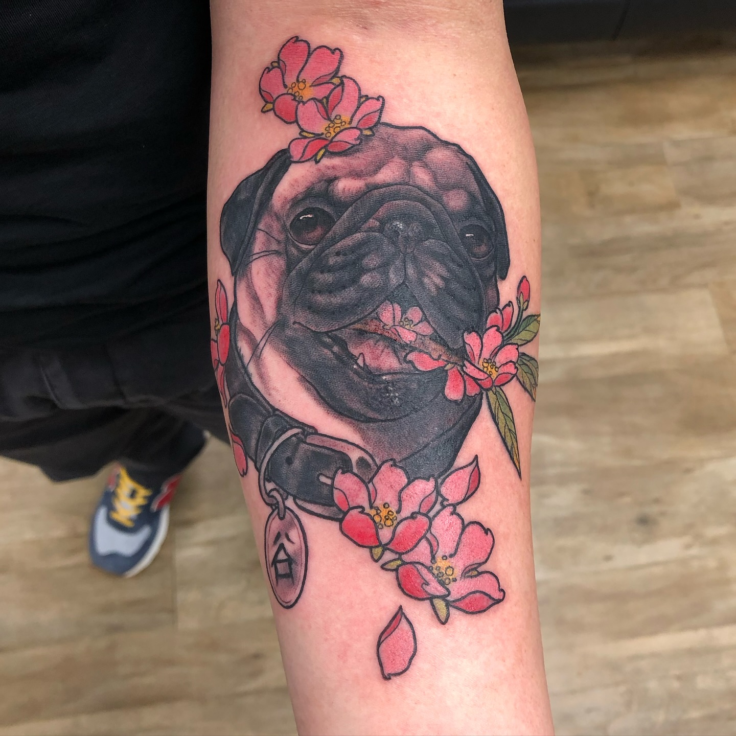 Pet pug portrait tattoo with cherry blossoms