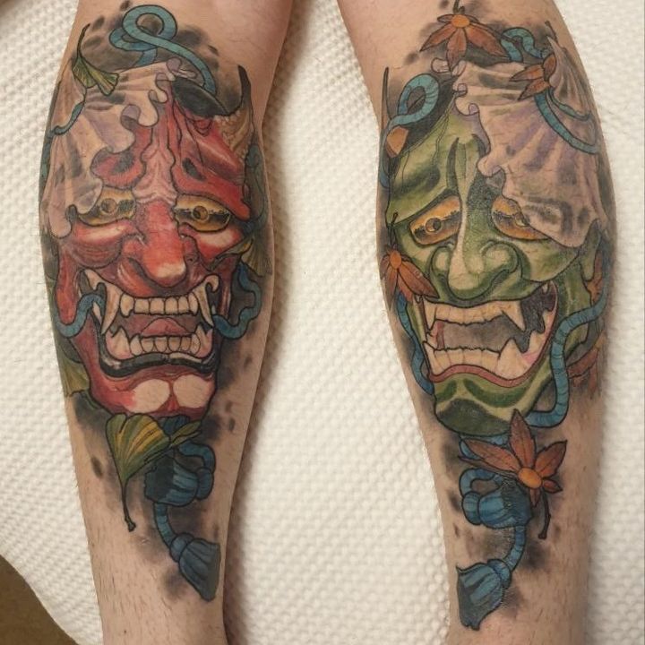 Matching hannya mask tattoos red and green