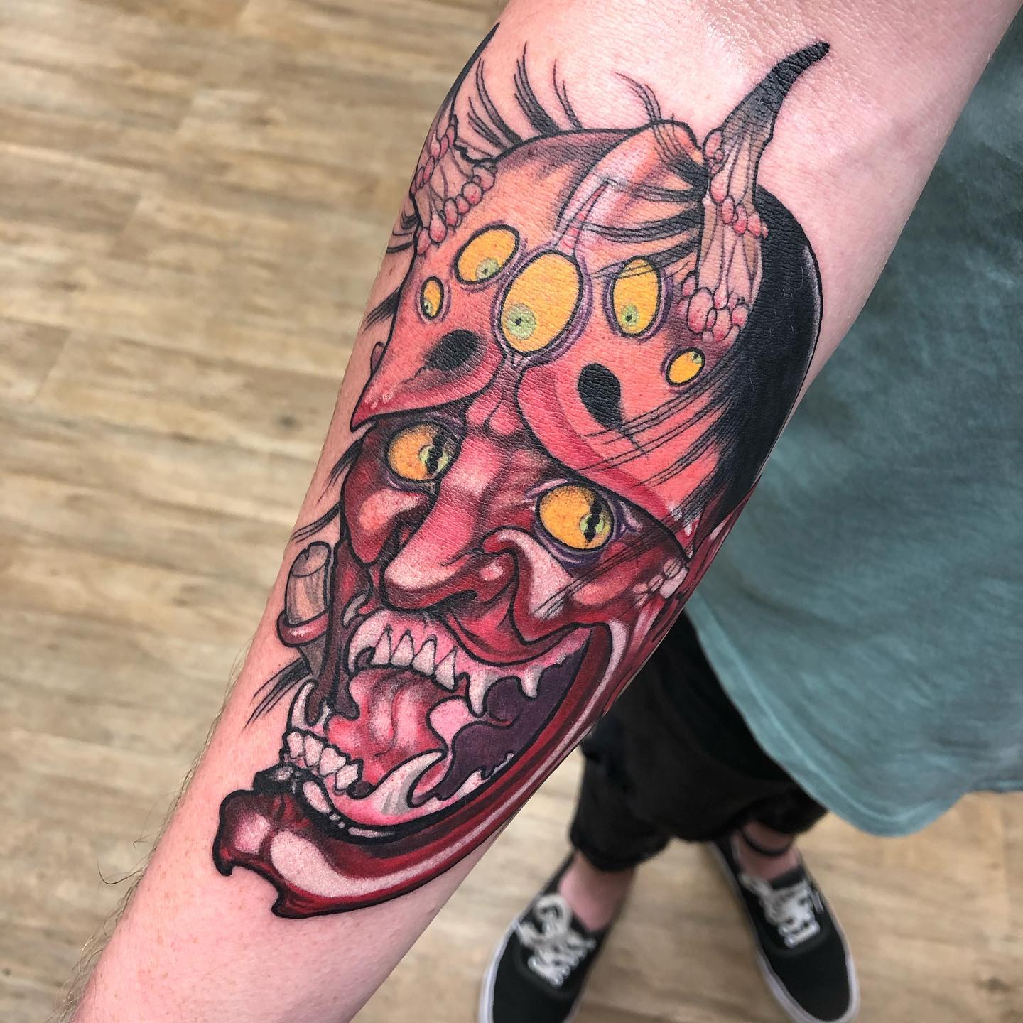 Multi-eyed oni demon tattoo red Japanese style