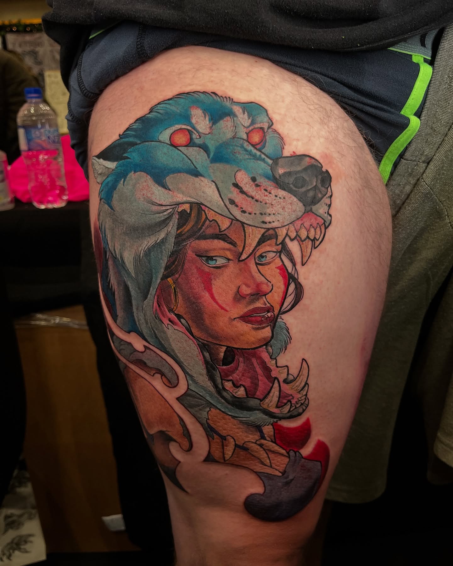 Warrior woman with wolf headdress tattoo